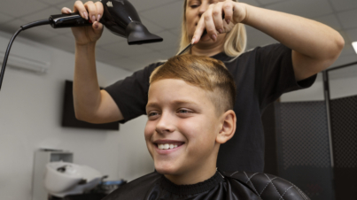 Student getting haircuts in Vaughan barber shop